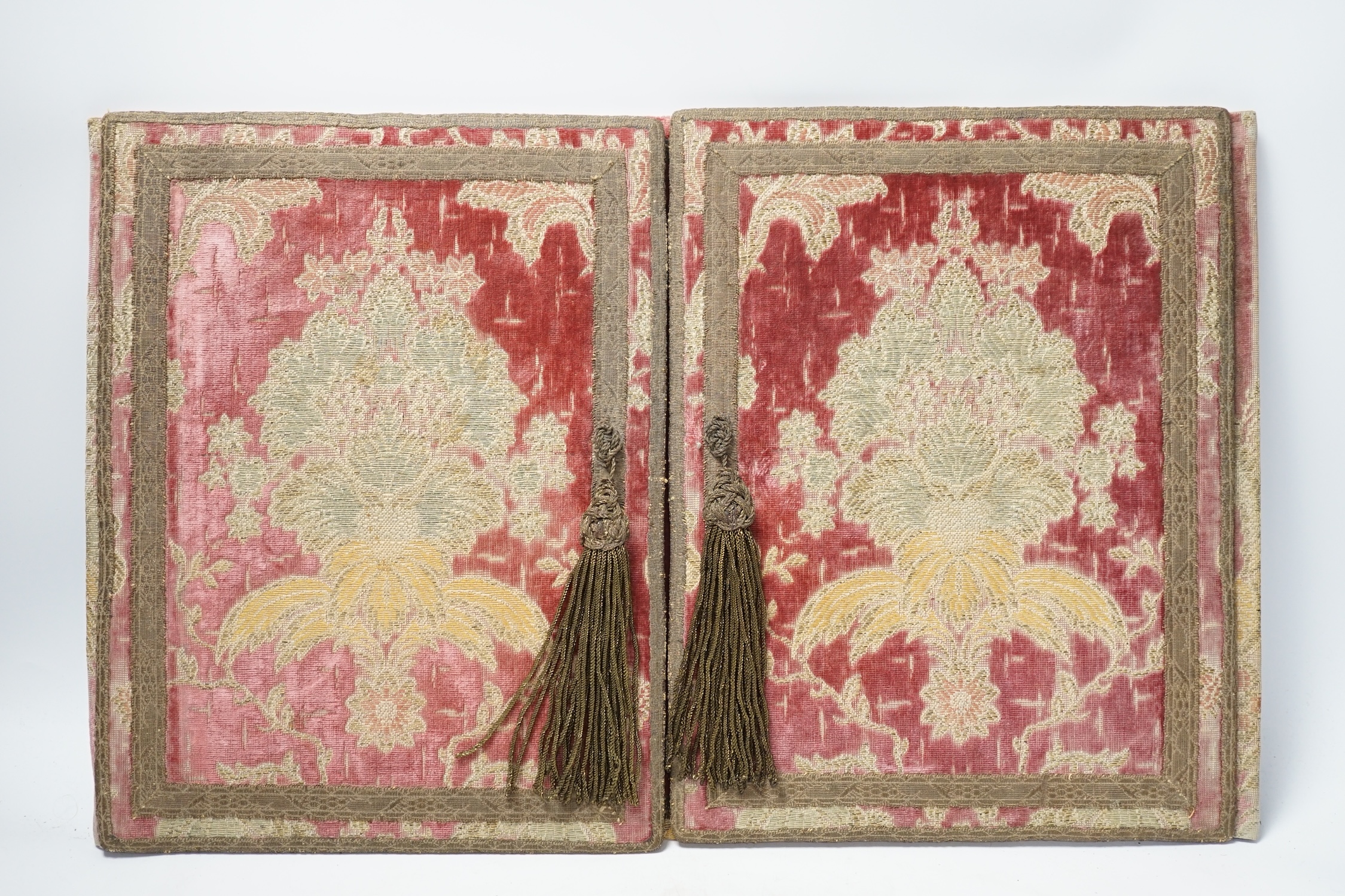 An 18th century style embroidered writing pad in damask and velvet, 32 x 51cm. Condition - poor to fair, generally faded
